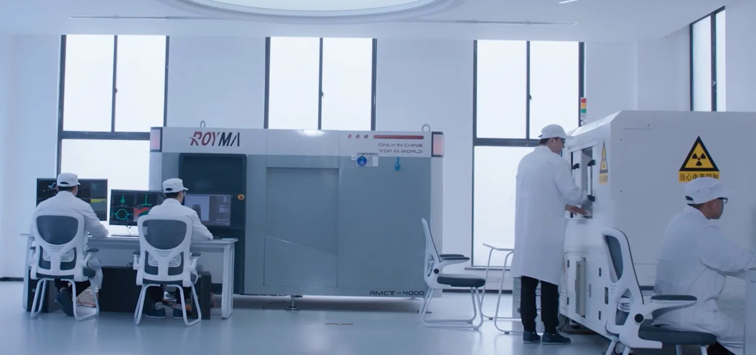 Royma engineers at a CT system