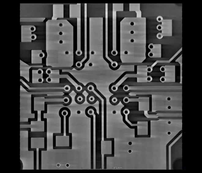 X-ray image of a PCB layer showing vias and traces