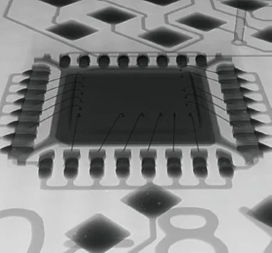 X-ray image of a QFP package showing the die and its wire bonds