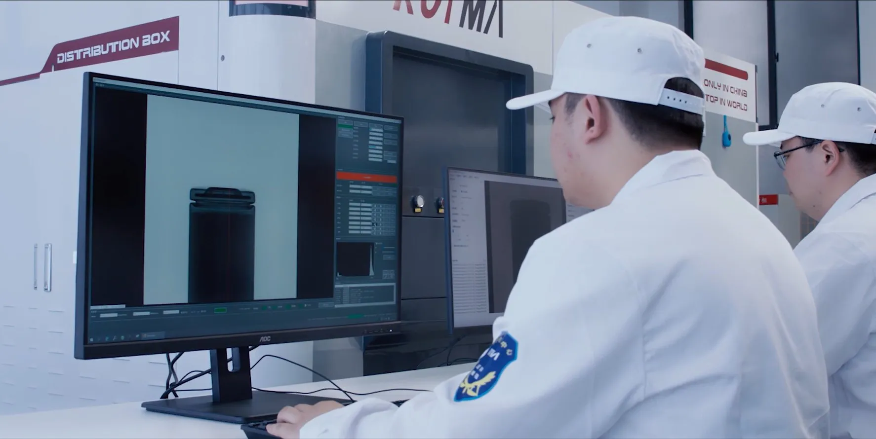 Royma engineers evaluating a CT scan at the workstation
