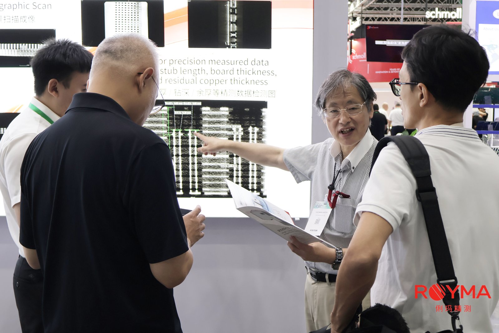 Discussion at the Royma booth